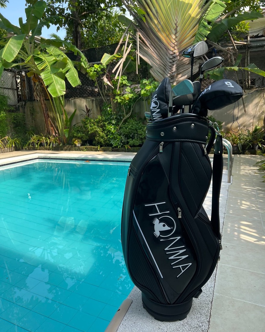 A Honma club photographed in daylight.